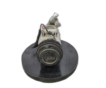 Compresor del aire acondicionado 6560524 de Opel Corsa b