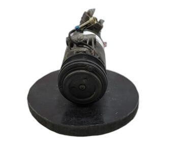 Compresor del aire acondicionado 09165714 de Opel Corsa c